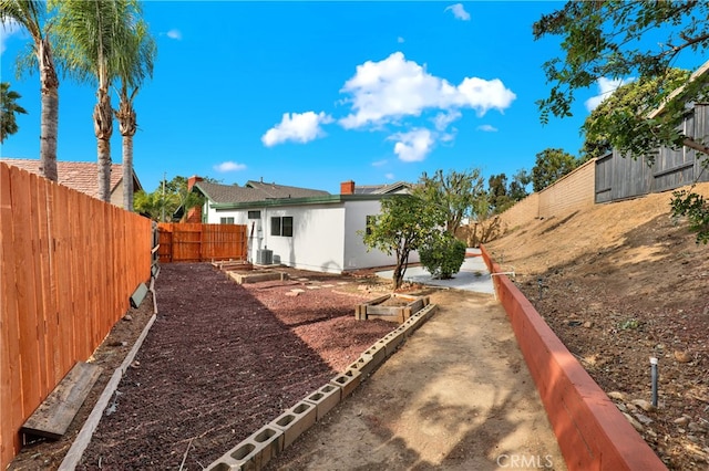 view of yard featuring central AC