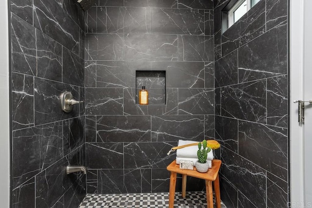 bathroom featuring tiled shower