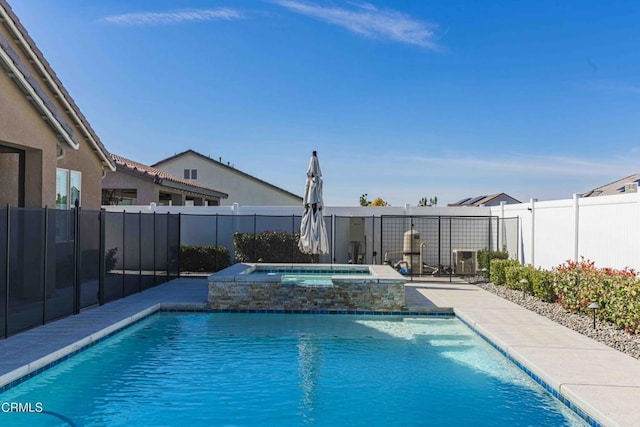 14706 Pemberley Passage Ave, Bakersfield, CA 93311 - view of swimming pool with an in ground hot tub