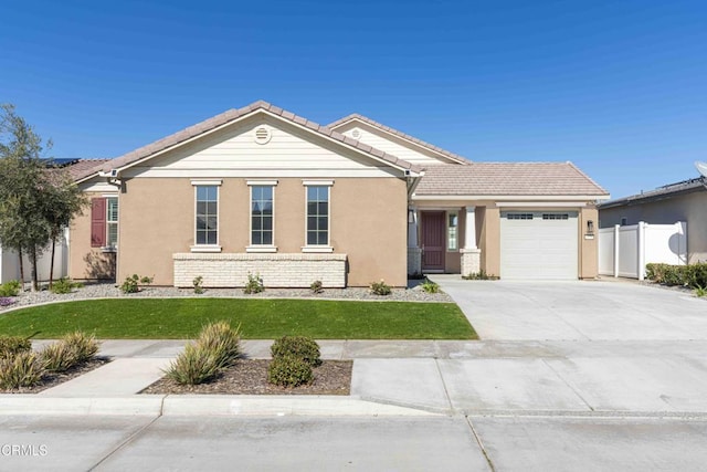 14706 Pemberley Passage Ave, Bakersfield, CA 93311 - view of front facade featuring a garage and a front yard