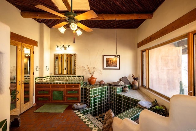 bathroom featuring brick floor, ceiling fan, vanity, wooden ceiling, and beamed ceiling