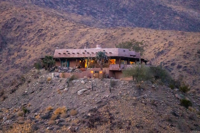 view of front of home with a mountain view