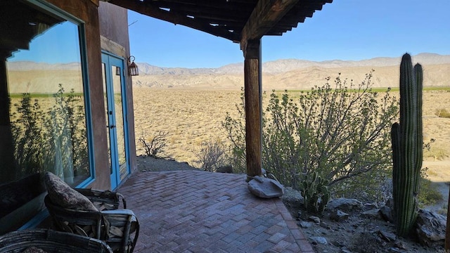 view of patio featuring a mountain view