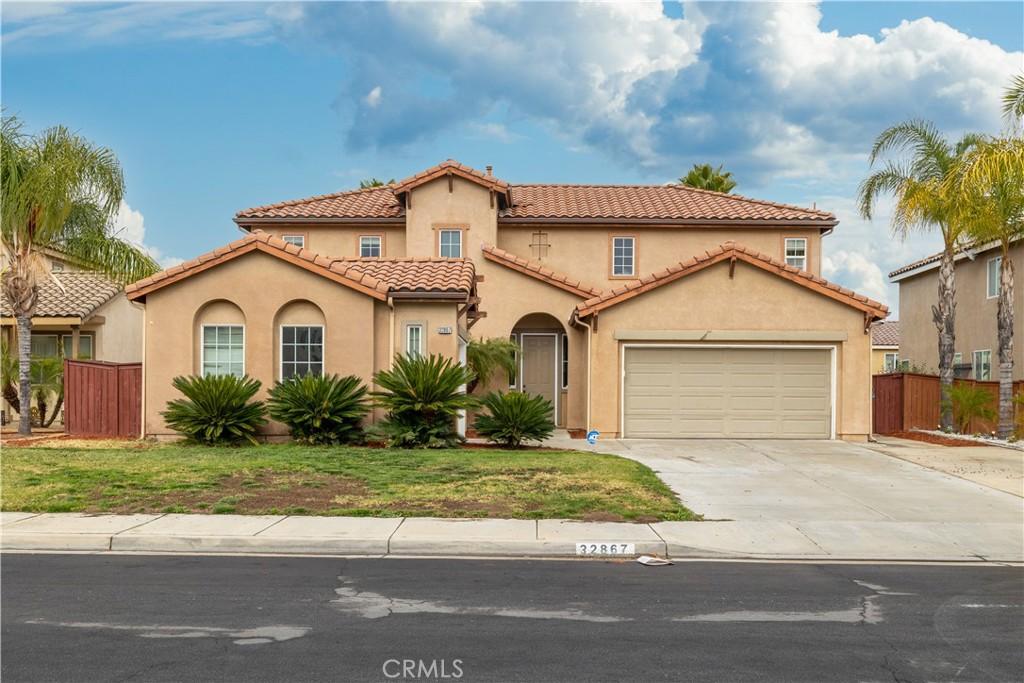 32867 Sandal Wood Ln, Lake Elsinore, CA 92530 - mediterranean / spanish house featuring a garage