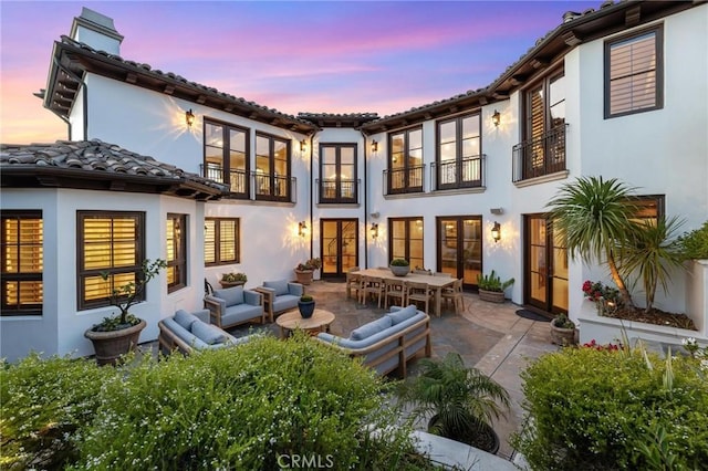 212 John St, Manhattan Beach, CA 90266 - back of house with a patio area, outdoor lounge area, a balcony, french doors, and stucco siding