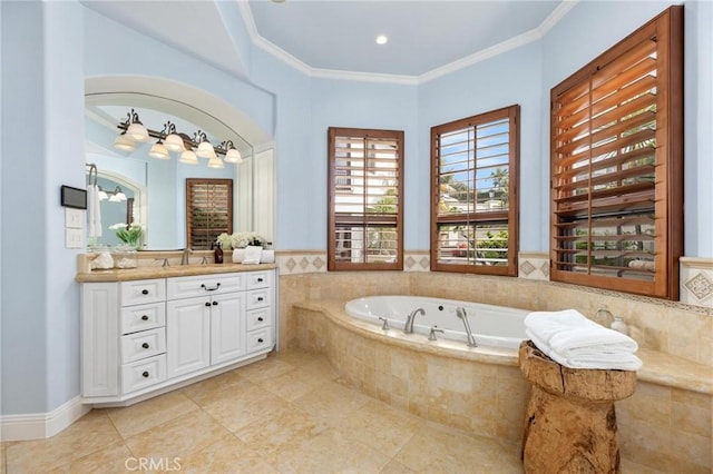 212 John St, Manhattan Beach, CA 90266 - bathroom featuring tile patterned floors, a garden tub, vanity, and ornamental molding