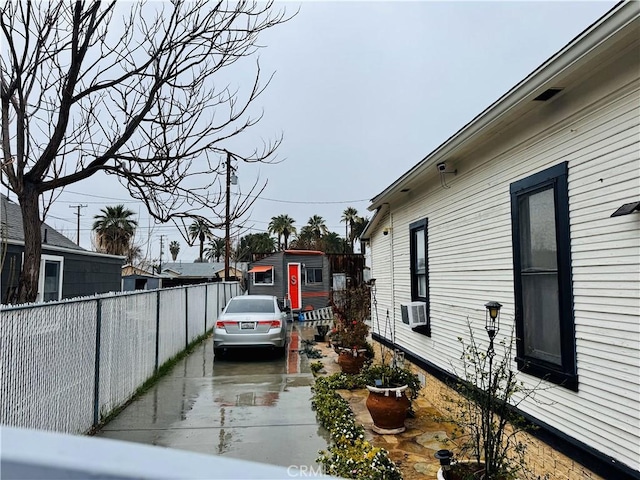 view of home's exterior with cooling unit