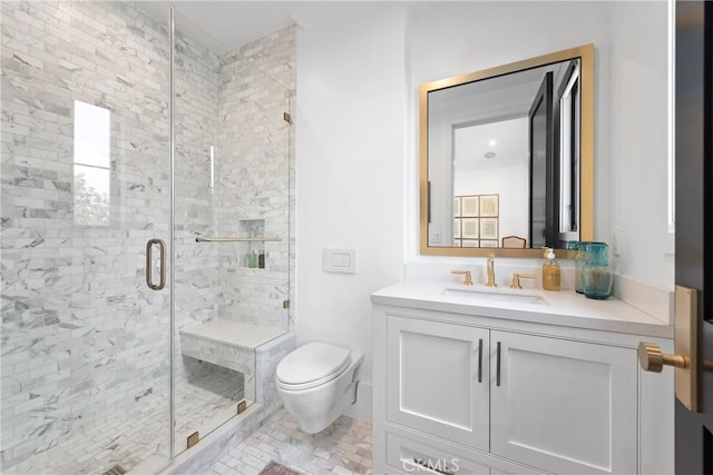 full bathroom with toilet, a shower stall, and vanity