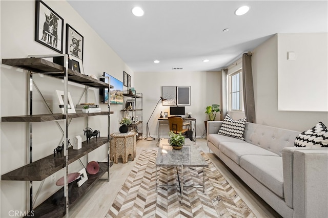 living room with visible vents and recessed lighting