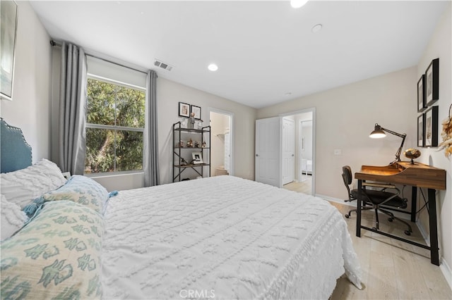 bedroom with light wood-type flooring, visible vents, baseboards, and recessed lighting