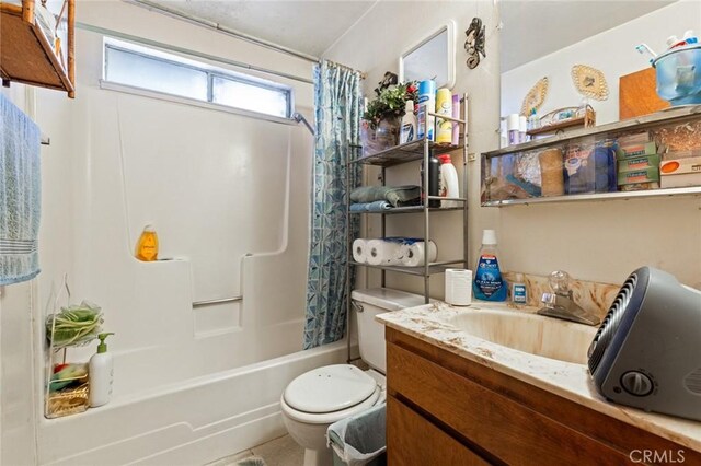 1062 Humboldt Ave, Chico, CA 95928 - full bathroom with vanity, toilet, and shower / bath combo with shower curtain