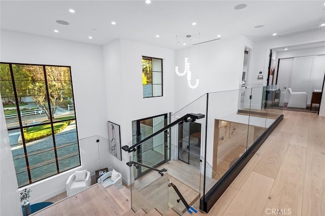 stairway featuring hardwood / wood-style flooring