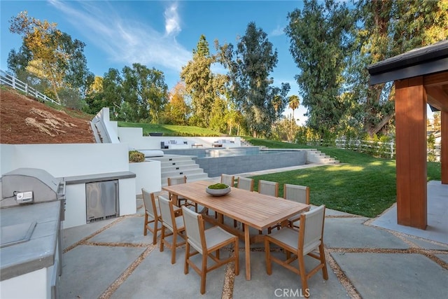 view of patio / terrace featuring an outdoor kitchen