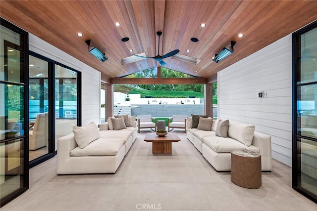 sunroom / solarium with lofted ceiling and wooden ceiling