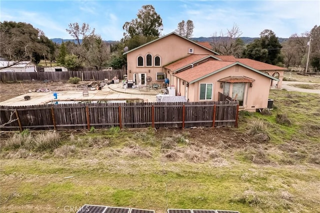 rear view of property with a patio area