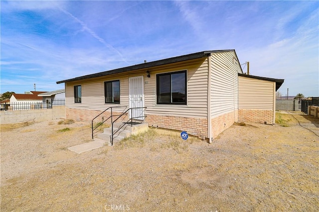 view of front of property with fence