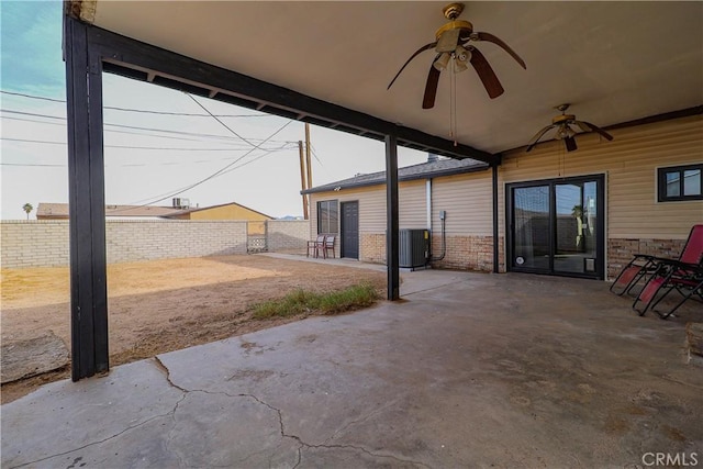 view of patio / terrace with central AC, a fenced backyard, and a ceiling fan