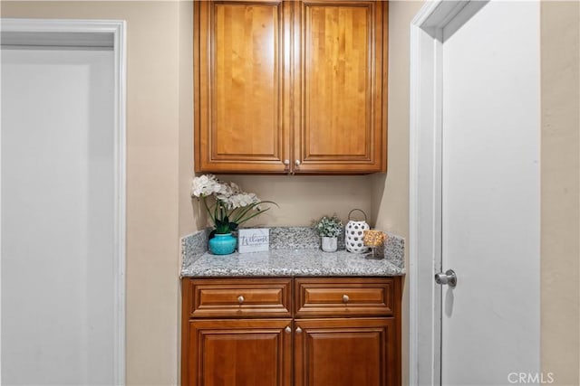 bar with light stone countertops