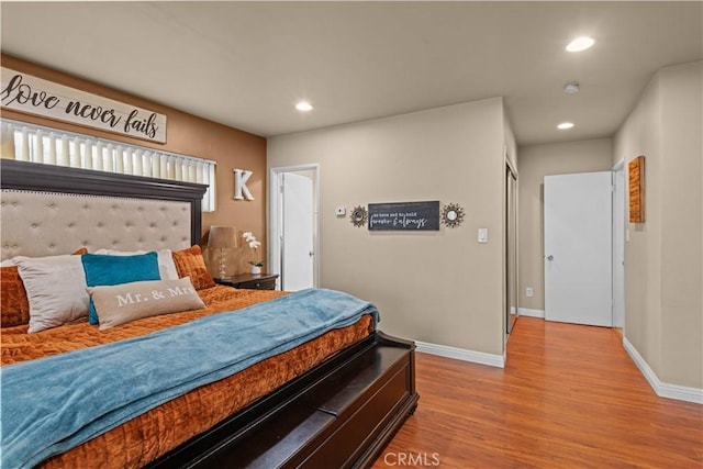 bedroom featuring light hardwood / wood-style flooring