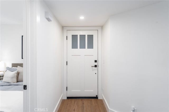 doorway featuring light hardwood / wood-style floors