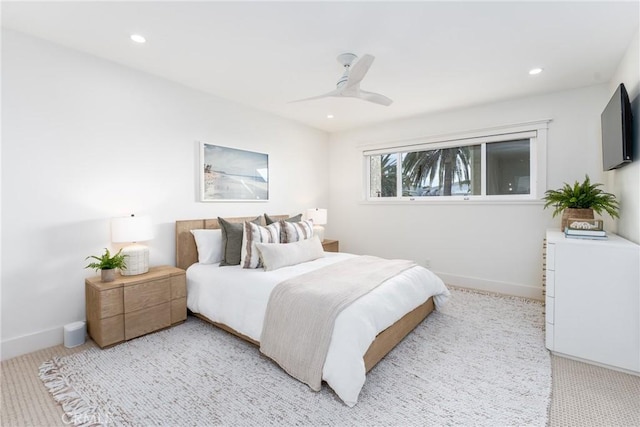 carpeted bedroom with ceiling fan