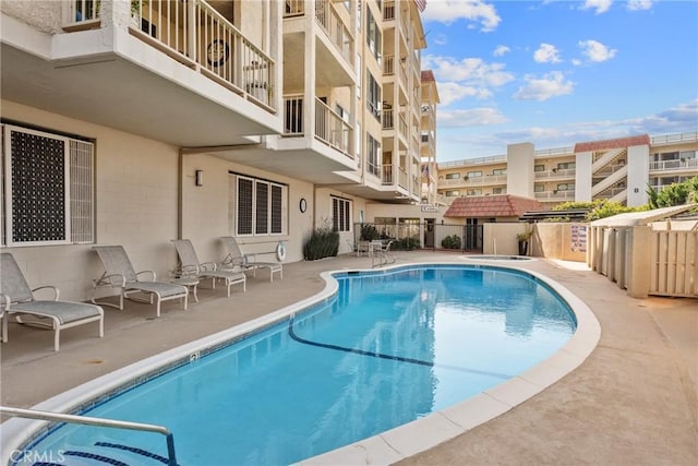 view of pool featuring a patio area