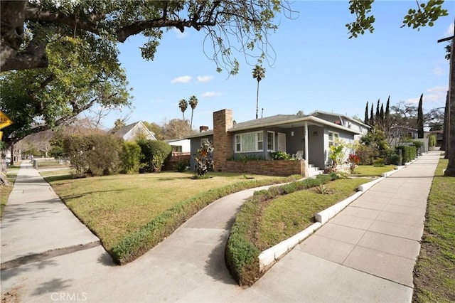 view of front of house with a front yard