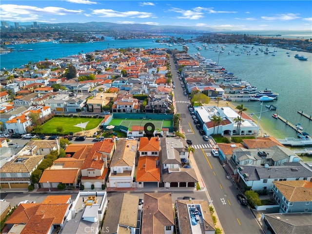 aerial view featuring a residential view and a water view