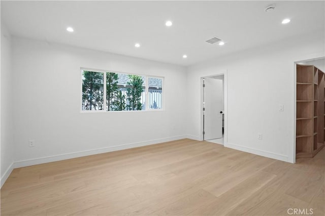 empty room featuring light hardwood / wood-style floors