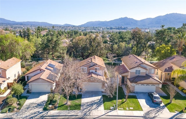 bird's eye view with a residential view and a mountain view