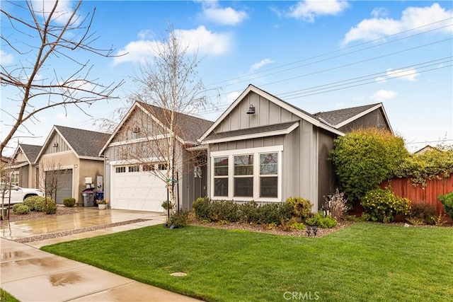 view of front facade featuring a garage and a front yard