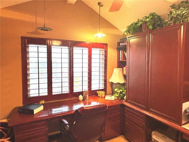 dining room featuring vaulted ceiling