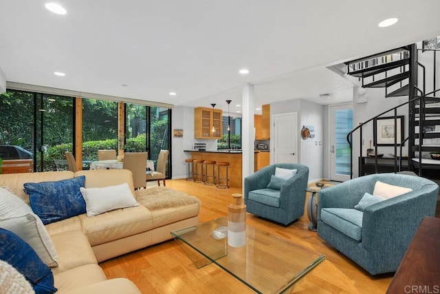 675 S Sierra Ave Unit 15, Solana Beach, CA 92075 - living area with stairway, wood finished floors, plenty of natural light, and recessed lighting