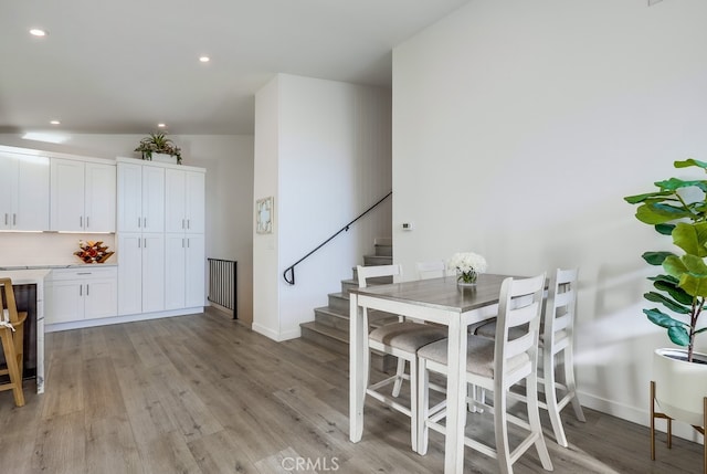 dining area featuring light hardwood / wood-style flooring