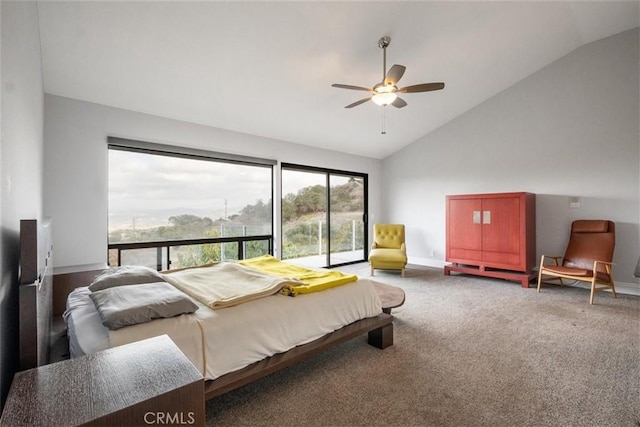 bedroom with carpet floors, lofted ceiling, and ceiling fan