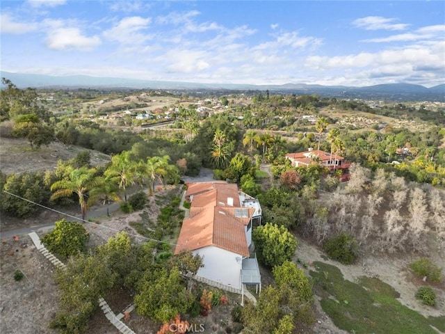 bird's eye view with a mountain view