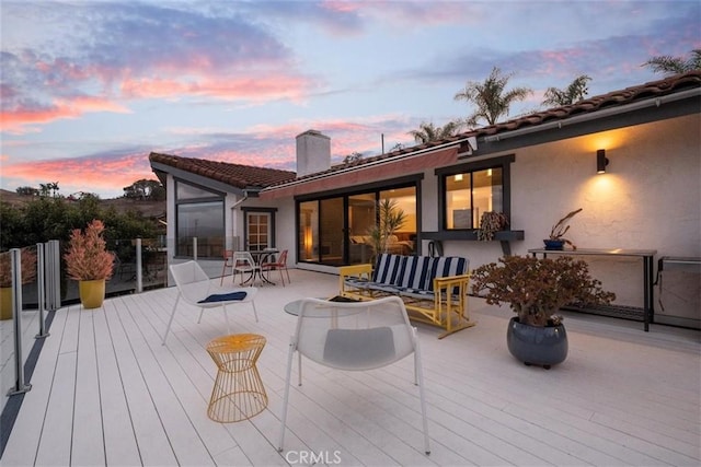 view of deck at dusk