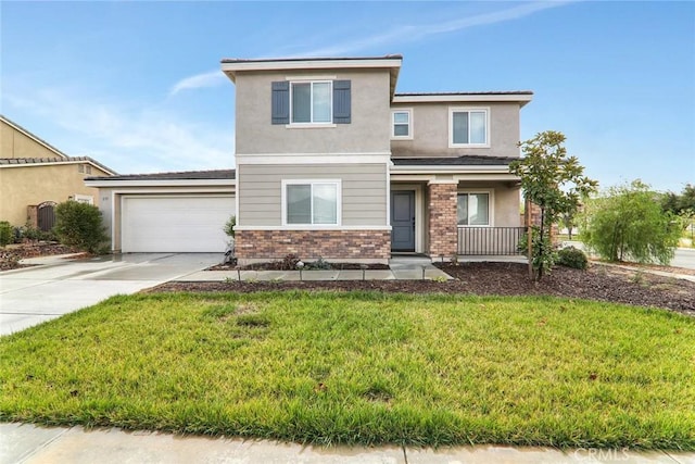 front of property with a garage and a front lawn