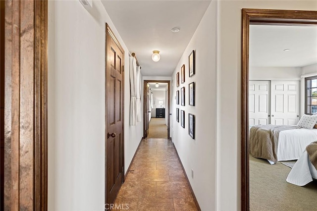 corridor with baseboards