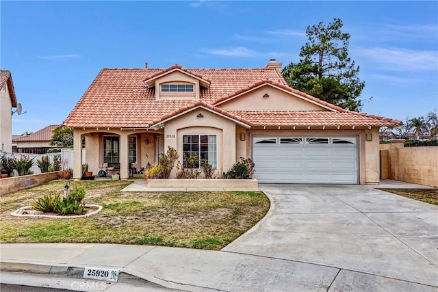 mediterranean / spanish-style house featuring a garage