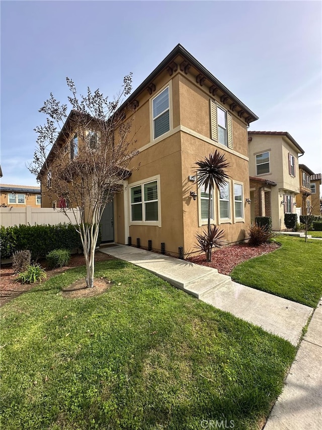 view of front of home with a front yard