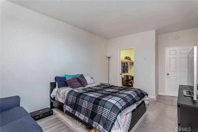 2525 E 19th St Unit 12, Signal Hill, CA 90755 - bedroom featuring baseboards