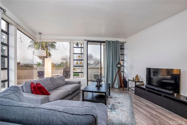 2525 E 19th St Unit 12, Signal Hill, CA 90755 - living area with wood finished floors
