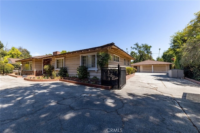 1640 Bedford Rd, San Marino, CA 91108 - view of front of property with a garage and an outbuilding