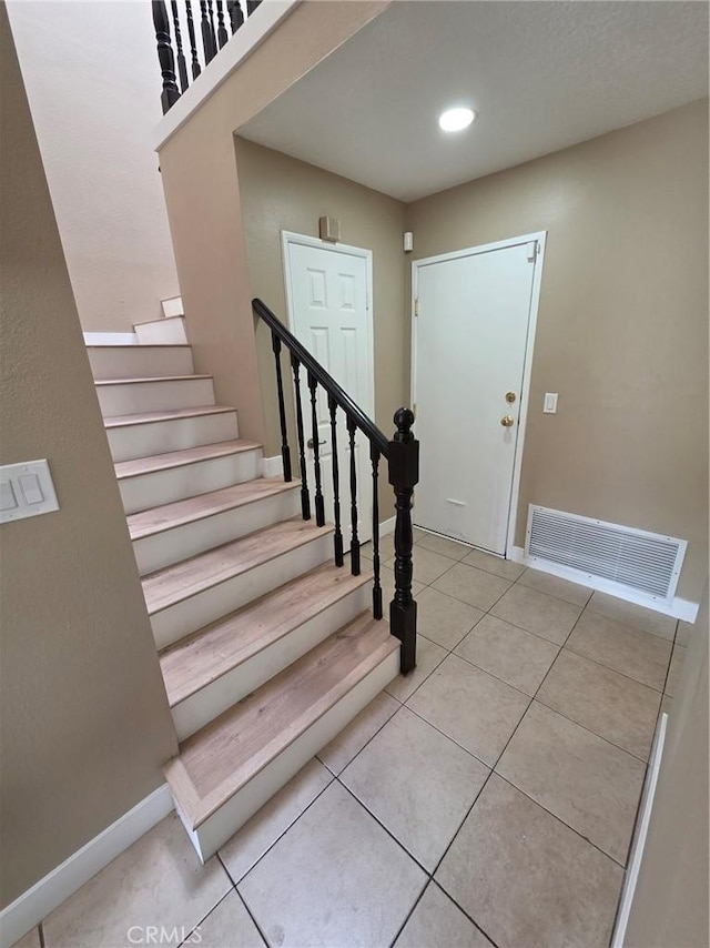 view of tiled foyer entrance