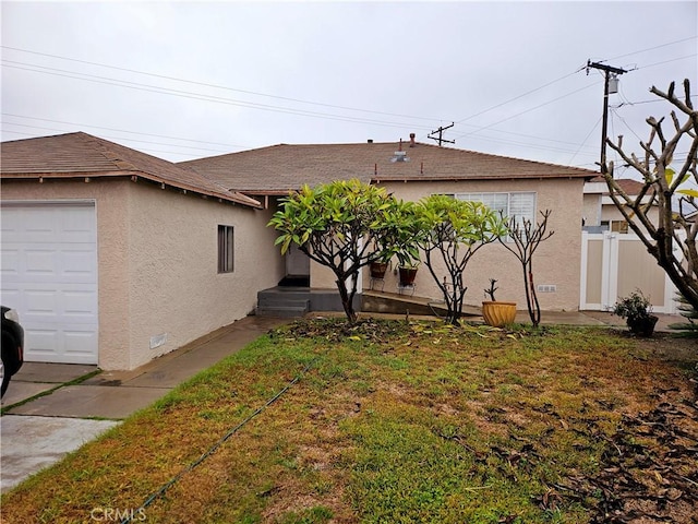 view of property exterior featuring a yard