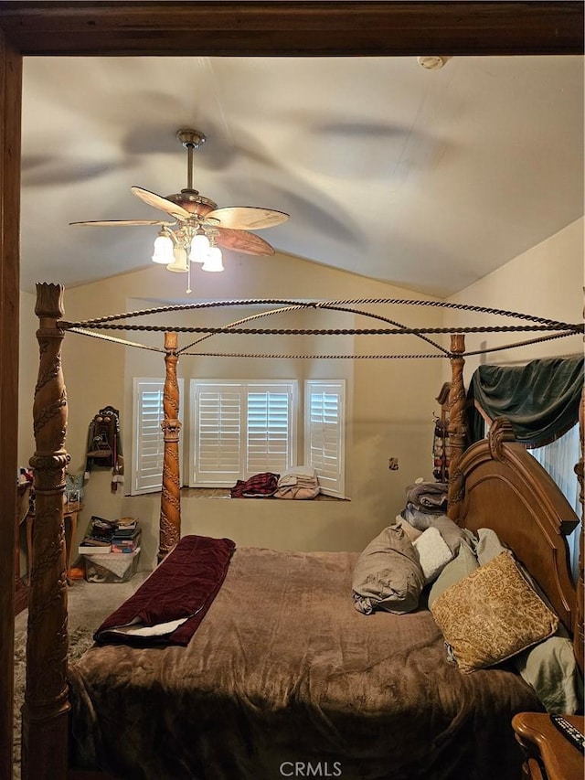 bedroom with vaulted ceiling and ceiling fan