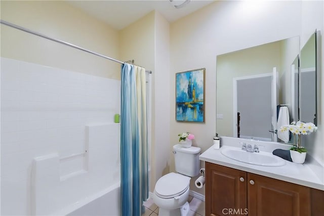 full bathroom featuring tile patterned flooring, vanity, shower / bath combo with shower curtain, and toilet