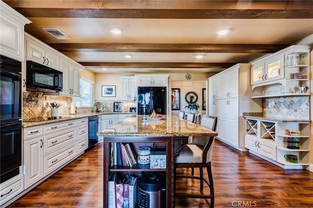 kitchen with white cabinetry, dark wood finished floors, black appliances, and open shelves