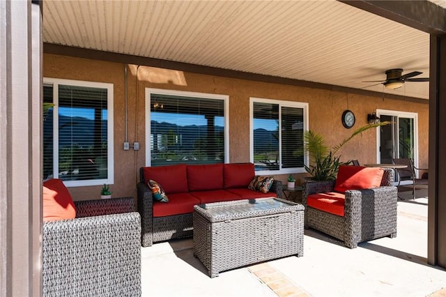 view of patio featuring an outdoor hangout area and a ceiling fan